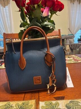 Dooney & Bourke Blue Pebbled Leather Satchel with Brown Trim and Gold Charm
